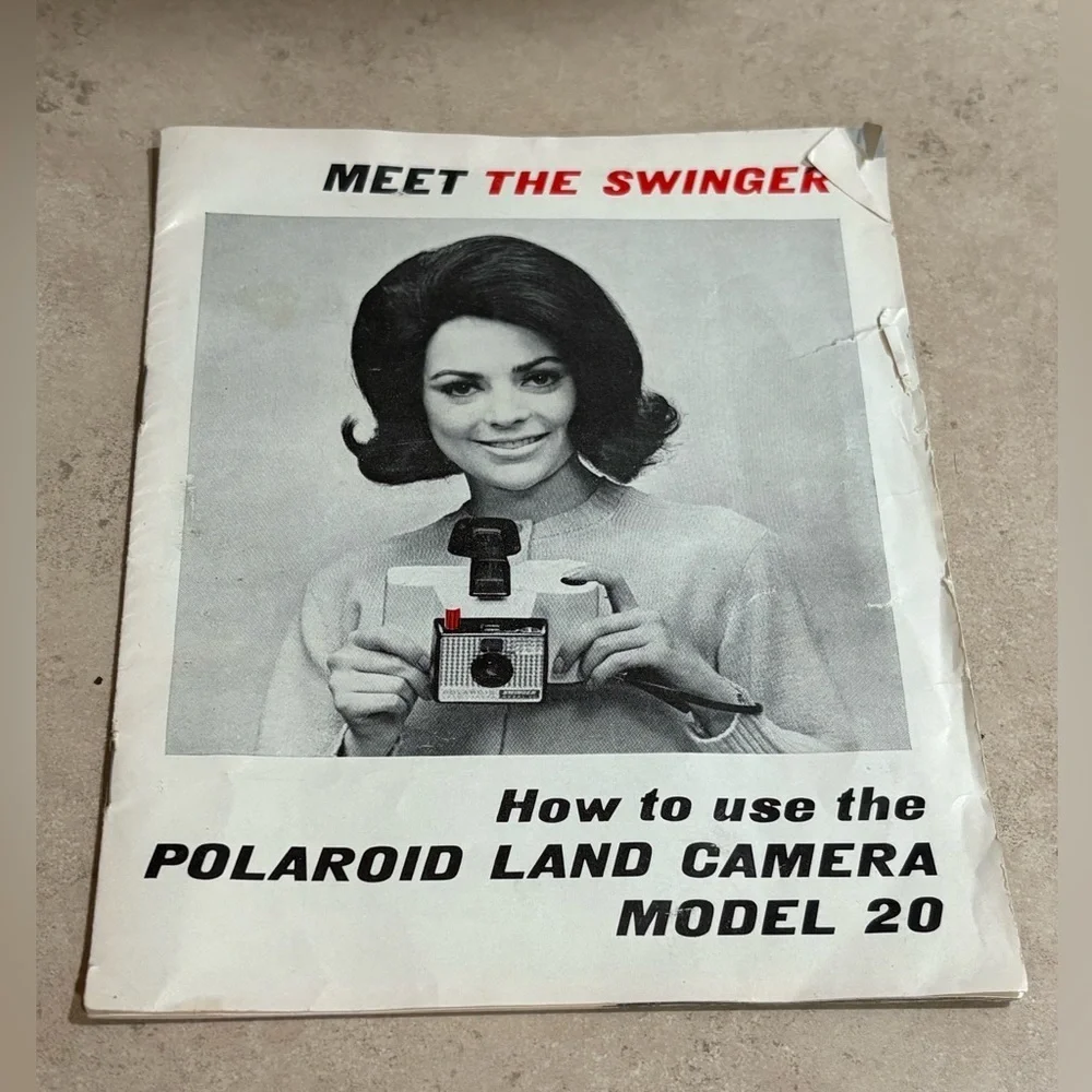Vintage Polaroid Swinger camera and case